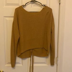 Golden colored sweater